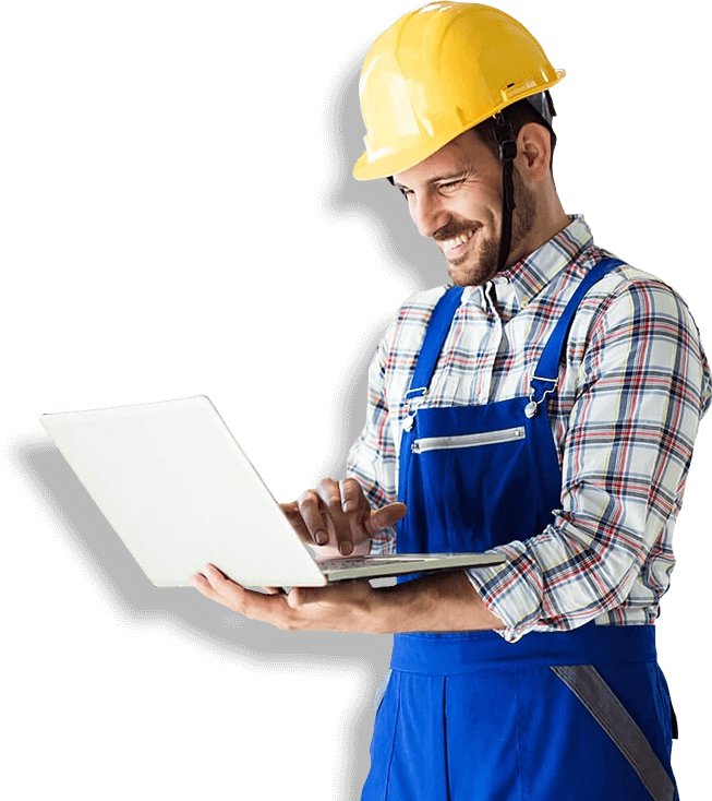 Manufacturing worker reviews data on laptop